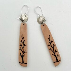handcrafted manzanita and nickel earrings with custom wood burning and Argentium sterling ear wires